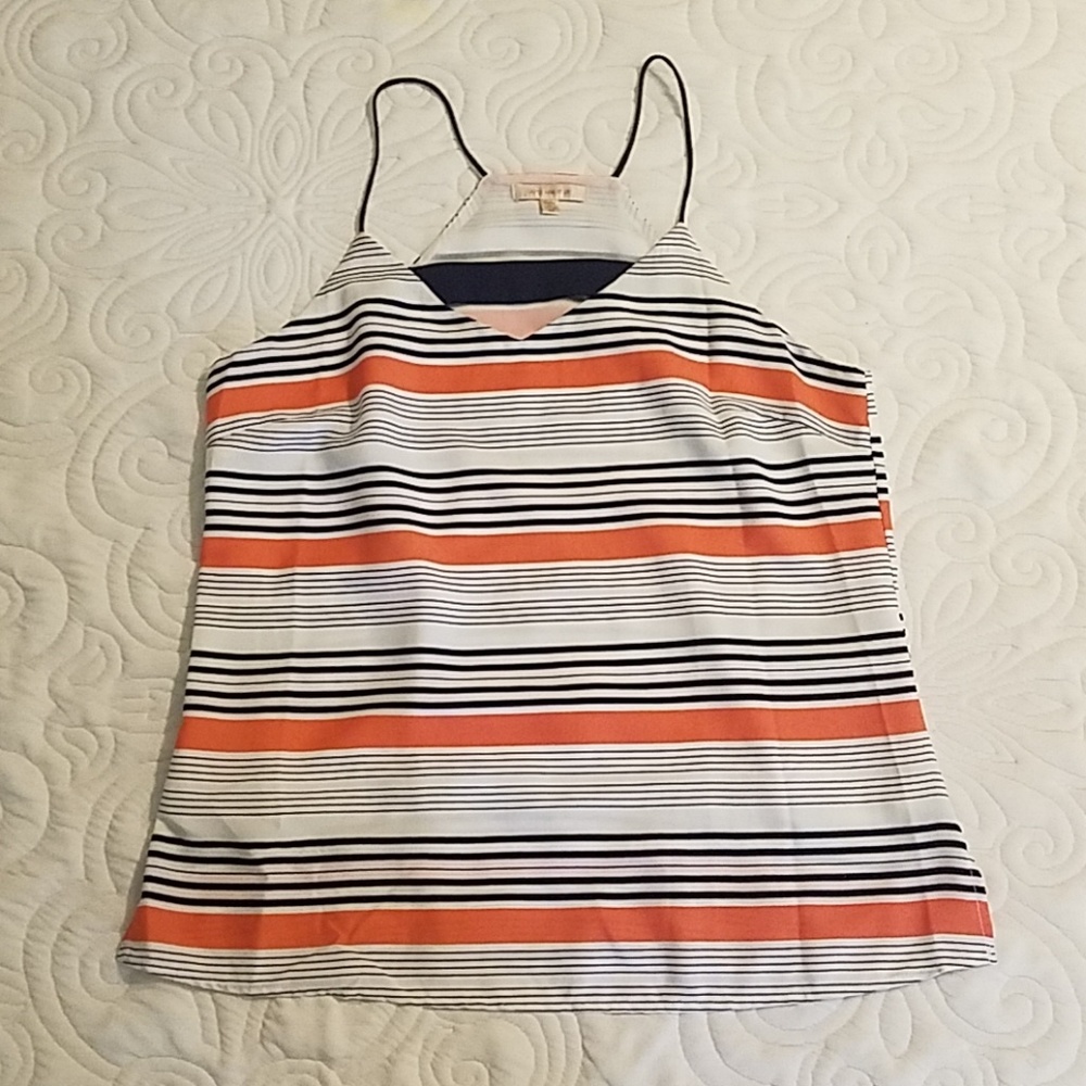 SKIES ARE BLUE

Auset Cutout Cami Blouse

Size: M